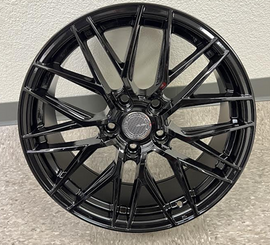 Elegant black alloy wheel with intricate split-spoke design, ideal for vehicle upgrades from Tires On Wheel.