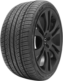 Performance tire with detailed tread on black alloy wheel