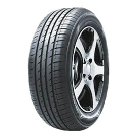 All-season tire on black multi-spoke wheel