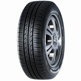 All-season tire with detailed tread on silver alloy wheel